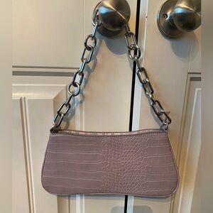 A new age mauve purse